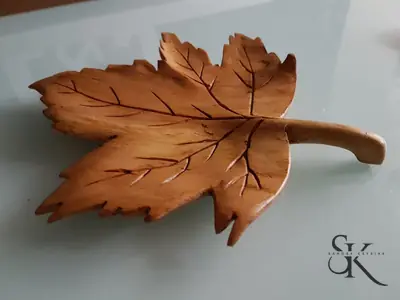 Hoja tallada de madera con mango