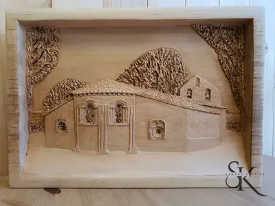 Relieve de una casa en un marco